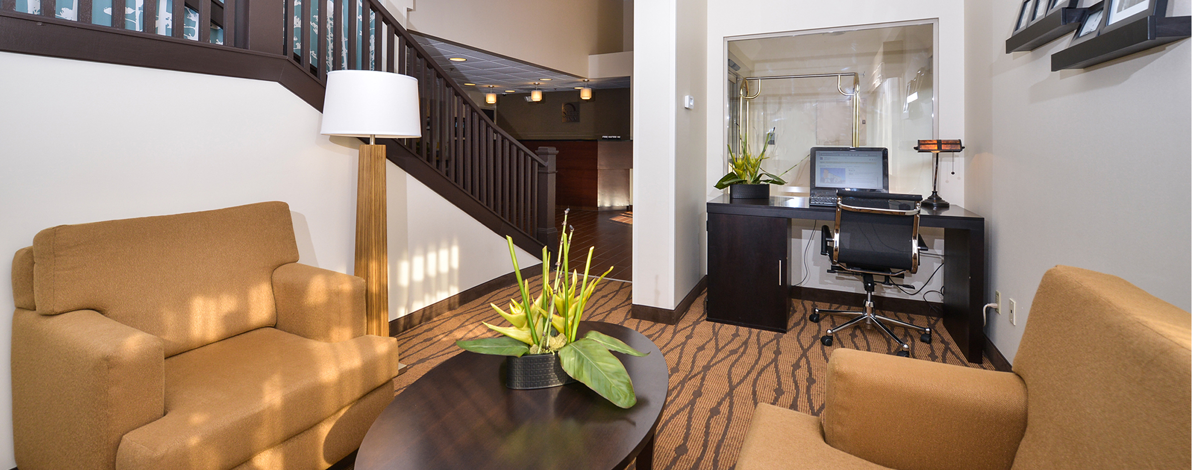 Chairs and business center at Sleep Inn Amherst